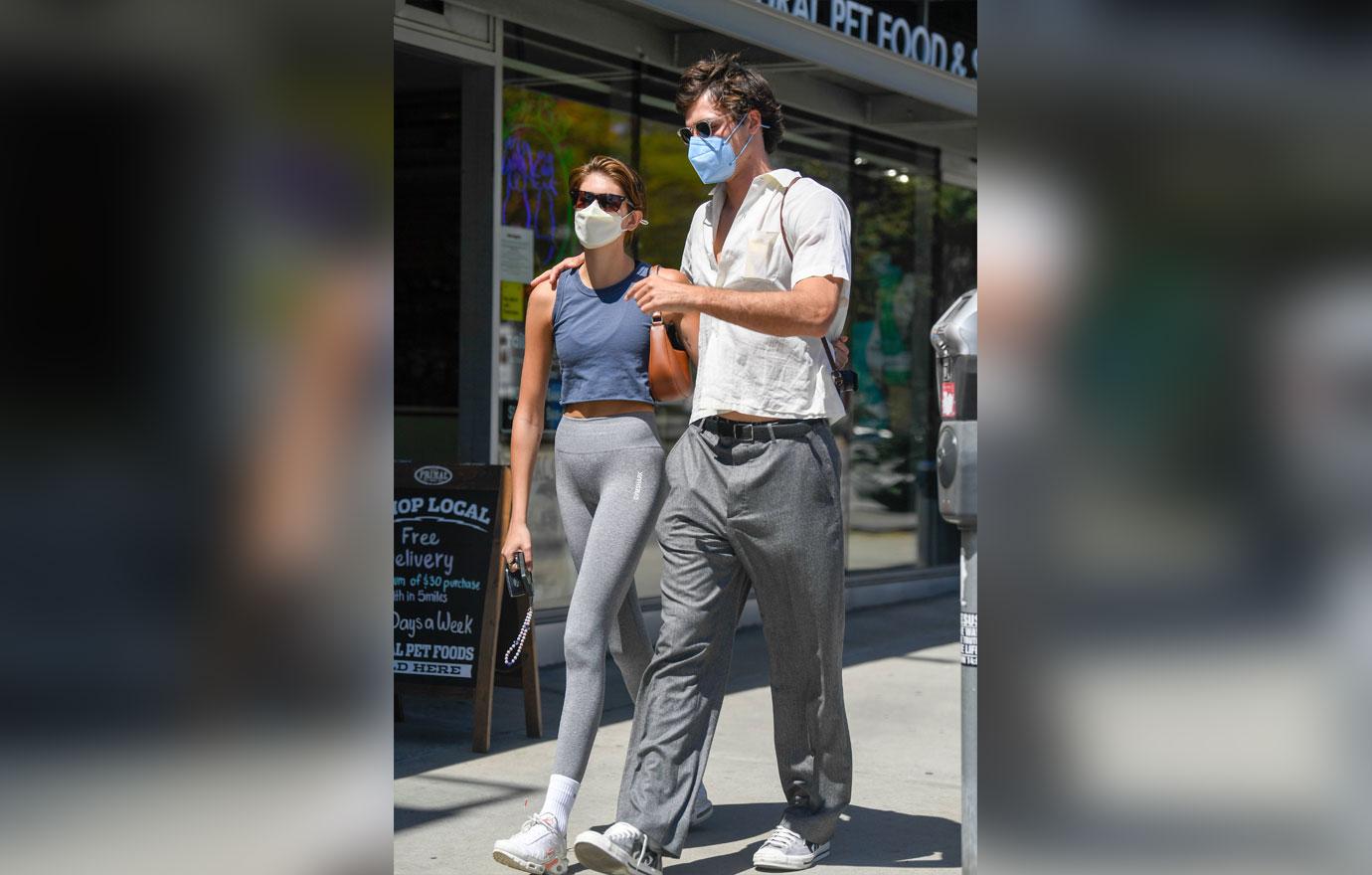 Kaia Gerber And Jacob Elordi Wear Gray Pants To Lunch Photos