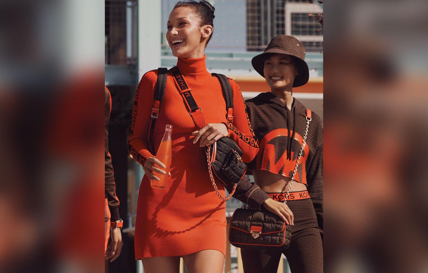 bella hadid takes a juice break on fashion shoot for michael kors