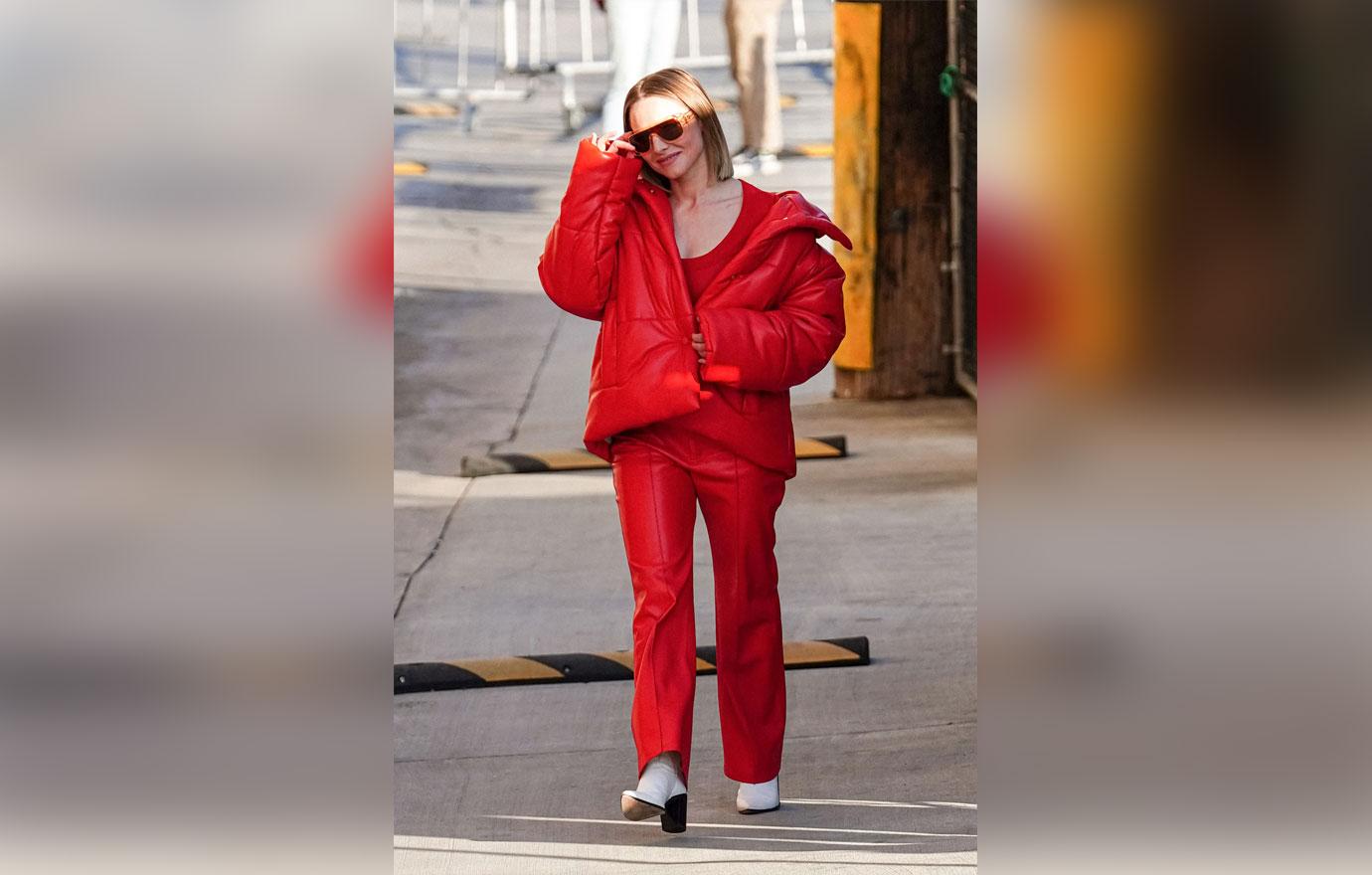 Kristen Bell Stands Out In Red Leather Coat & Matching Pants: Photos