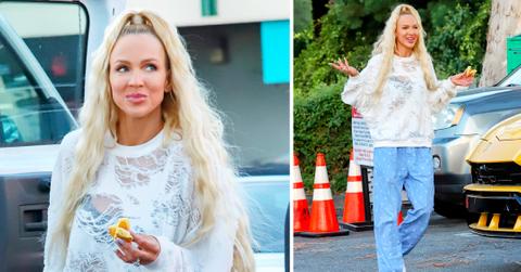 christine quinn downgrades as she leaves work in pajamas and slippers while eating cornbread