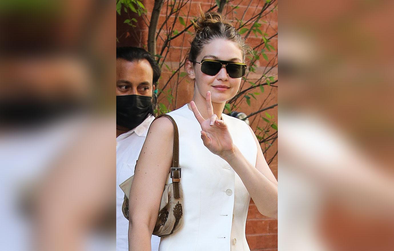 gigi hadid flashes a peace sign leaving mercer hotel