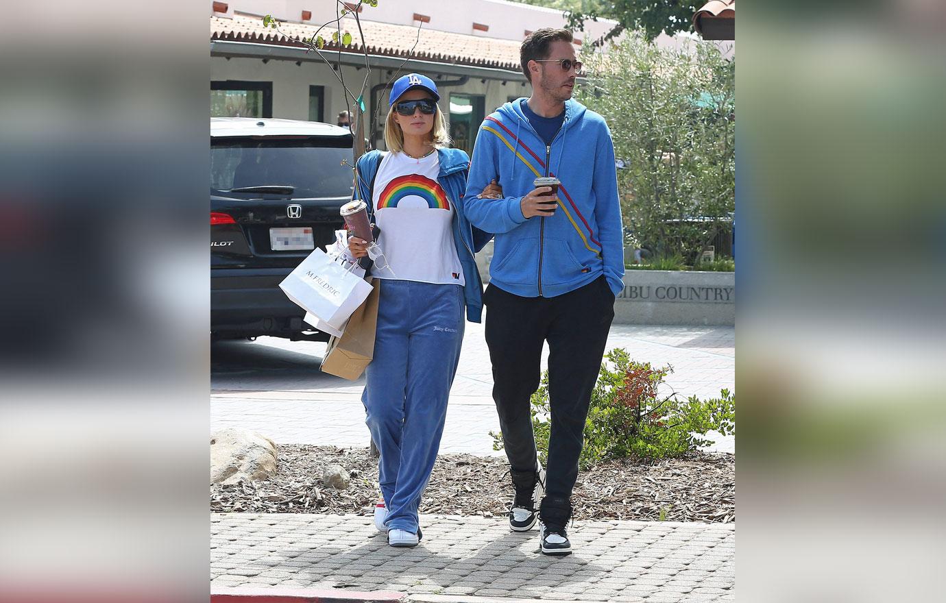 paris hilton and boyfriend cater reum stop for smoothies in malibu