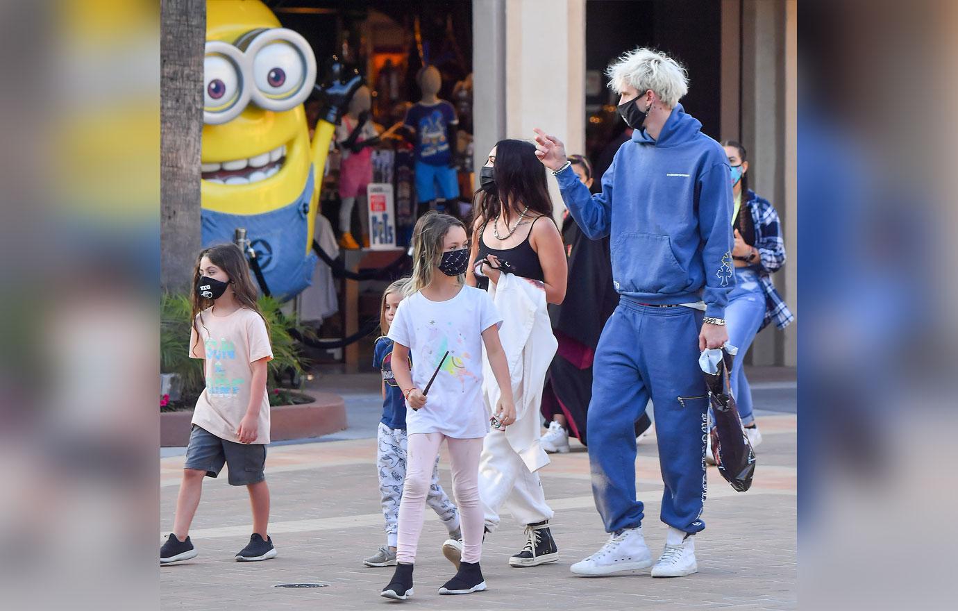 machine gun kelly and megan fox and three sons at universal studios