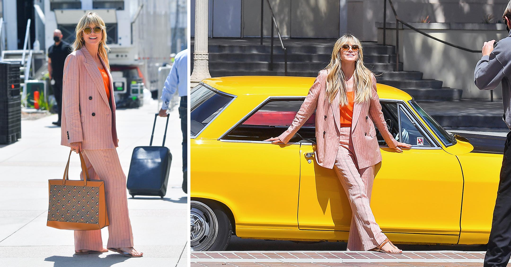 heidi klum poses in front of sports car outside of americas got talent