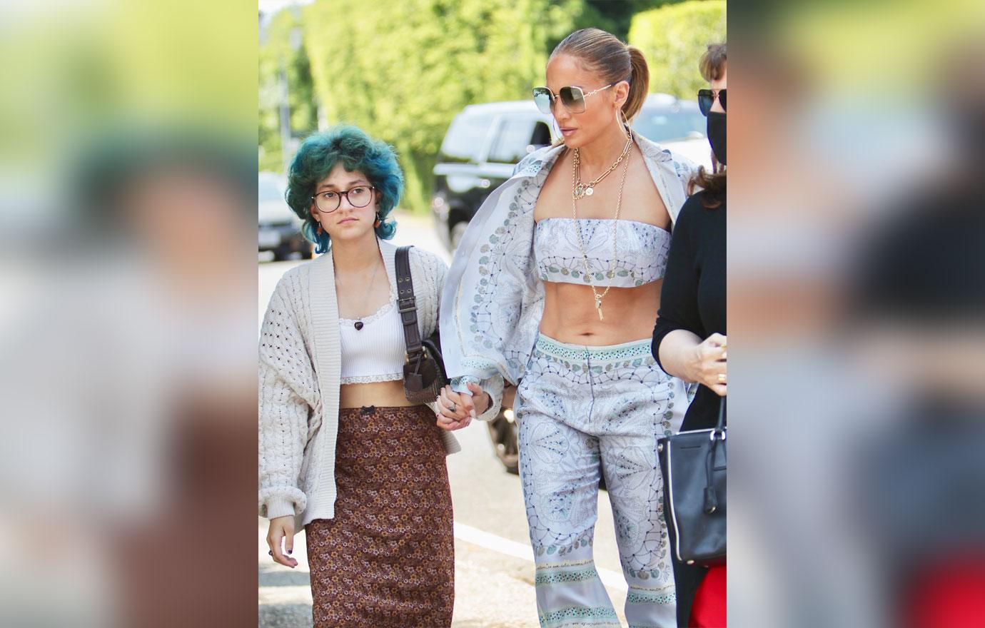 jennifer lopez attends the jennifer klein day of indulgence event with daughter emma showing off her toned abs