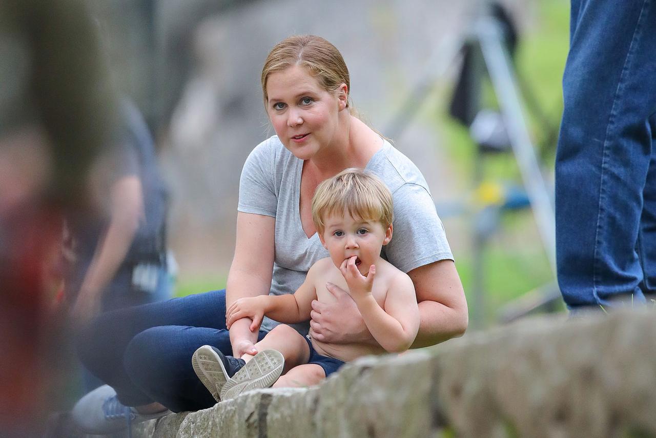 Amy Schumer Takes A Break From Filming To Play With Cute Son Gene Photos