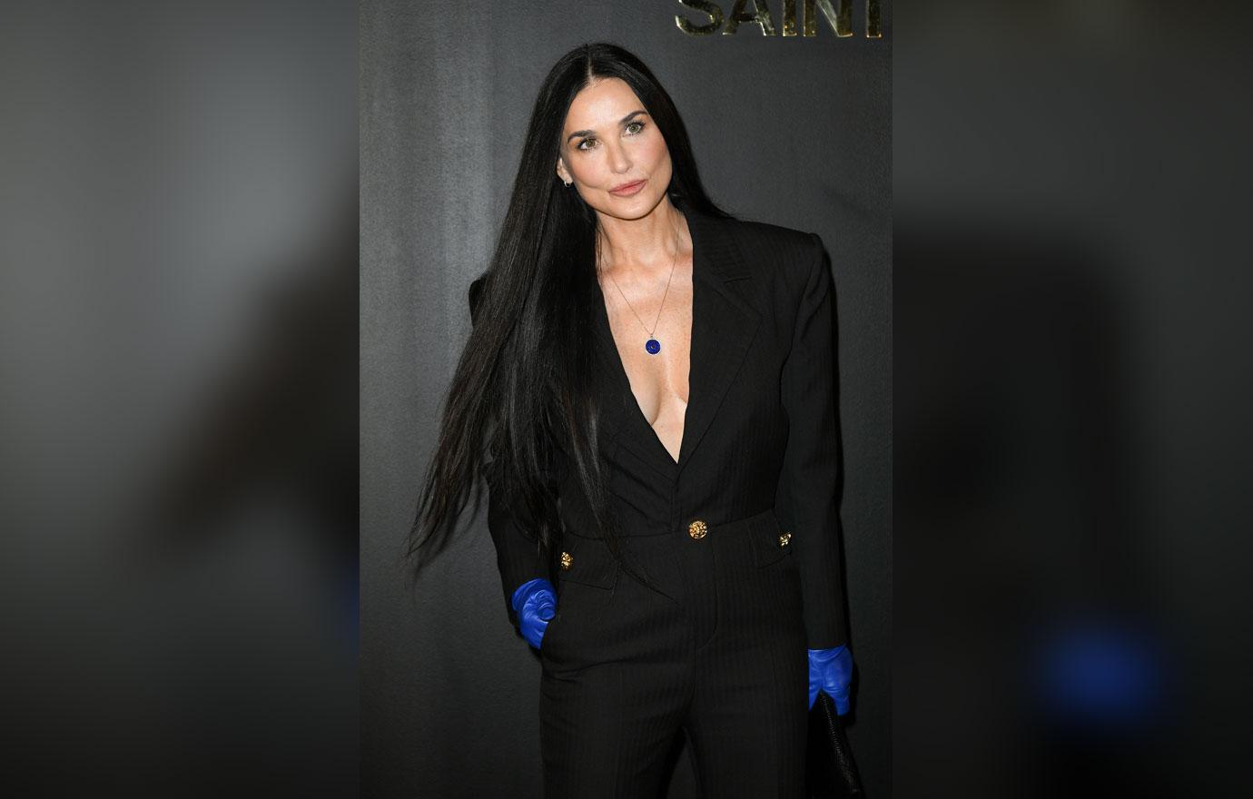 demi moore attends the saint laurent womenswear