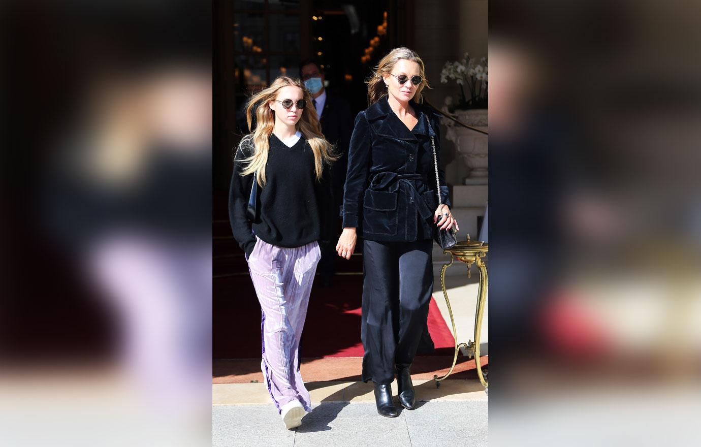 kate moss and lila grace seen leaving hotel in paris