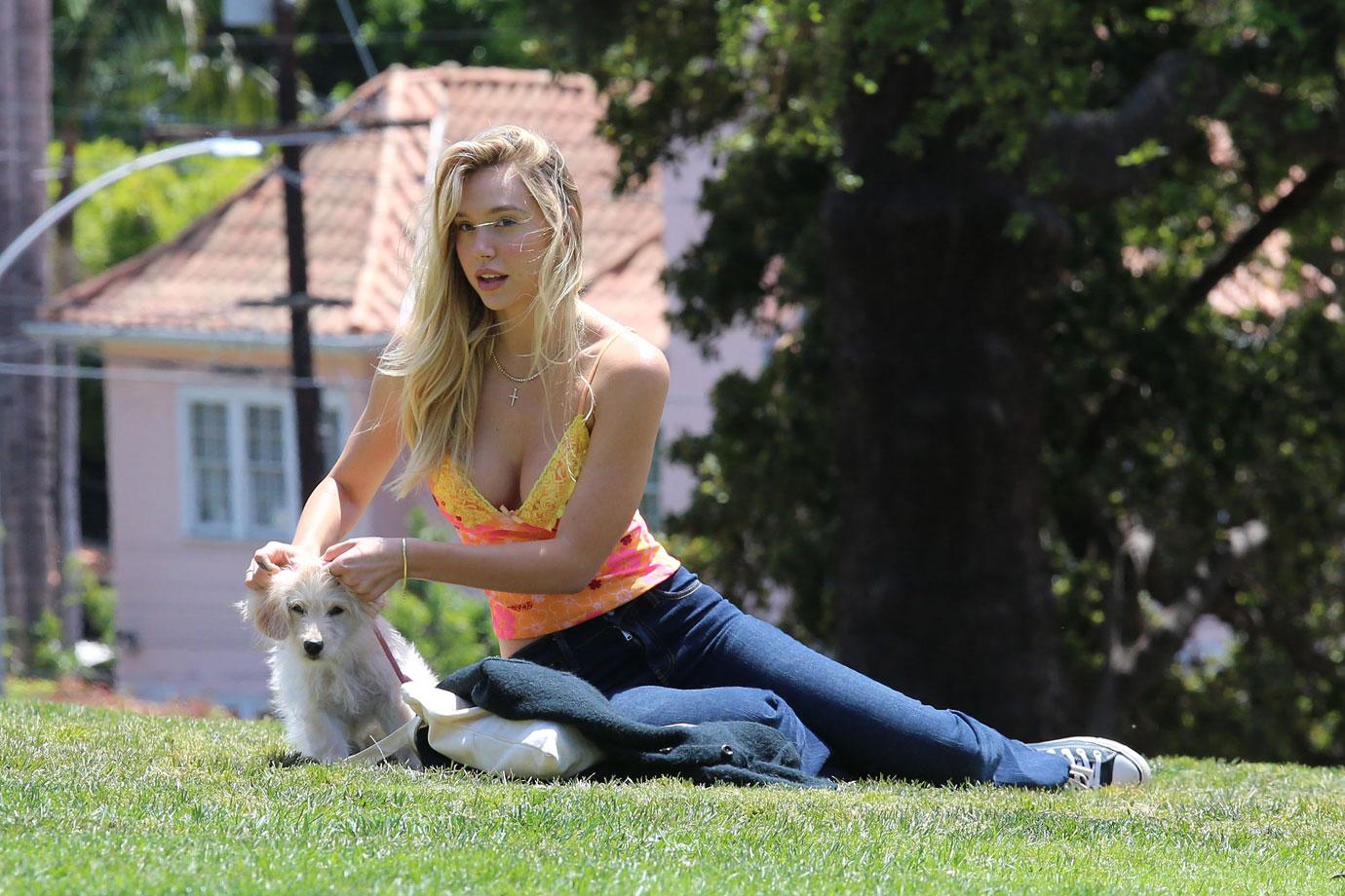 alexis ren in the park with her dog angel