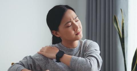 Photo of someone with shoulder pain.