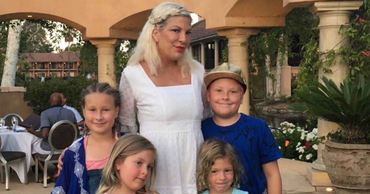 Tori Spelling with her kids posing for a photo