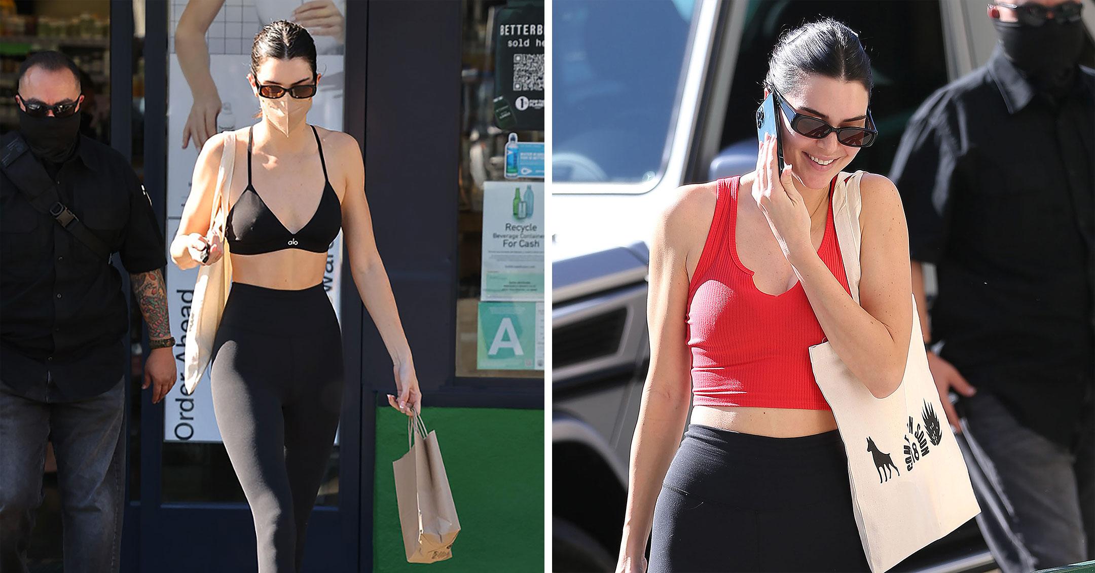 kendall jenner wears a white top, black leggings and nike sneakers