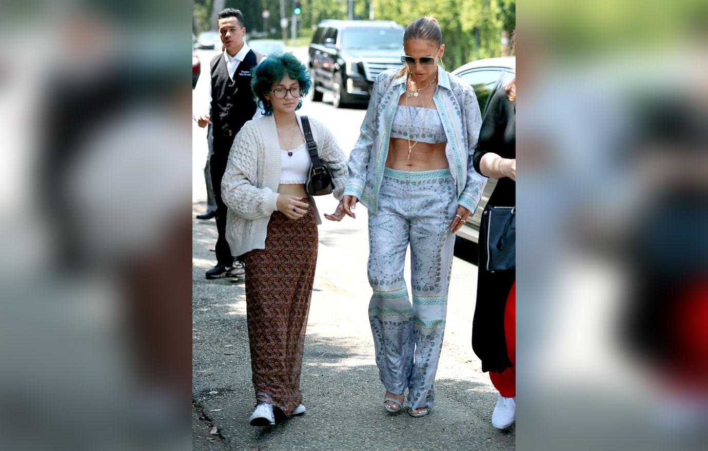 jennifer lopez attends the jennifer klein day of indulgence event with daughter emma showing off her toned abs