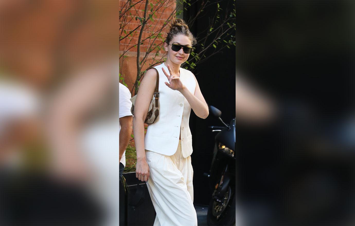 gigi hadid flashes a peace sign leaving mercer hotel