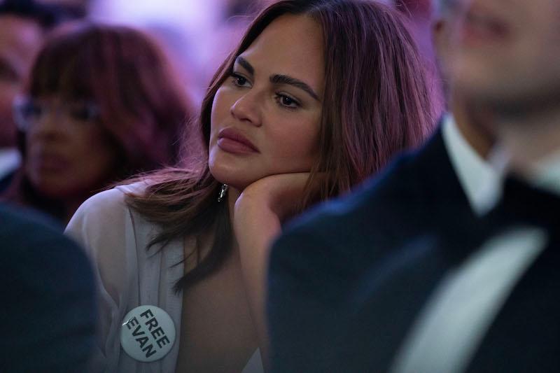 chrissy teigen dividing time kids