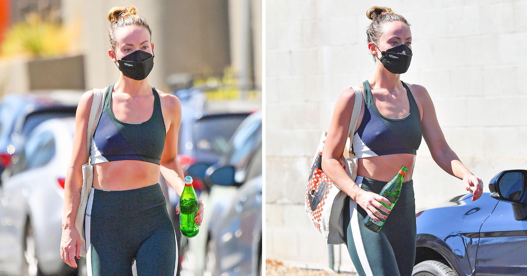 Olivia Wilde shows off her fit physique in a green crop top and