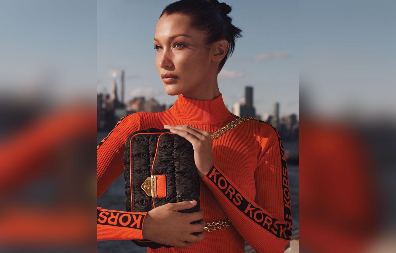 bella hadid takes a juice break on fashion shoot for michael kors