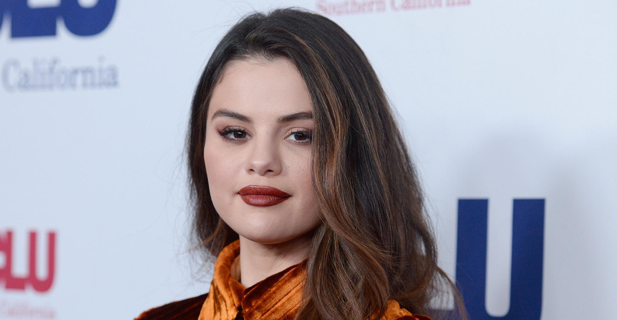 selena gomez launched makeup line to break down societys unrealistic standards of beauty