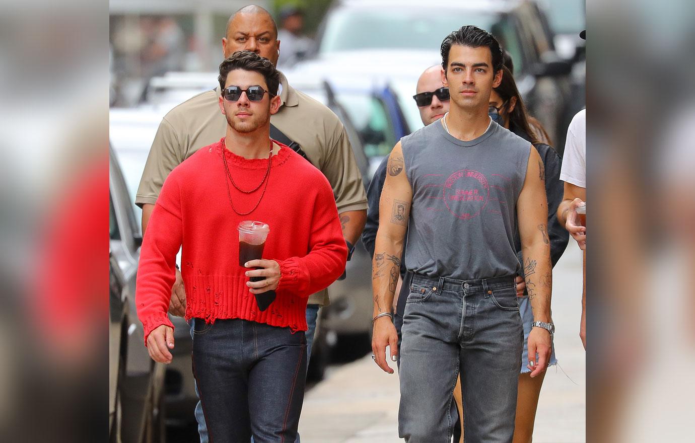 nick and joe jonas walking around tribeca