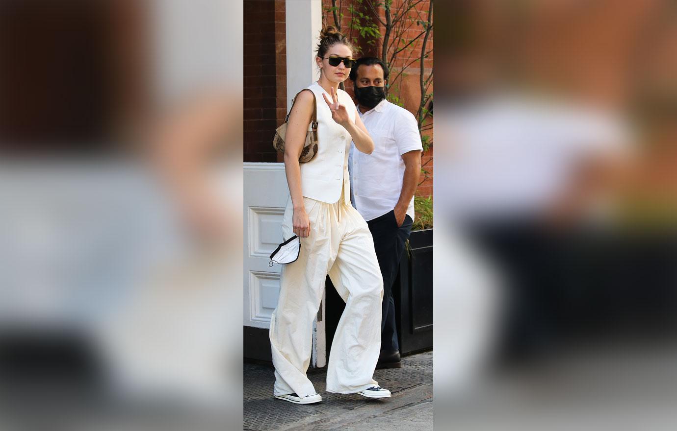 gigi hadid flashes a peace sign leaving mercer hotel