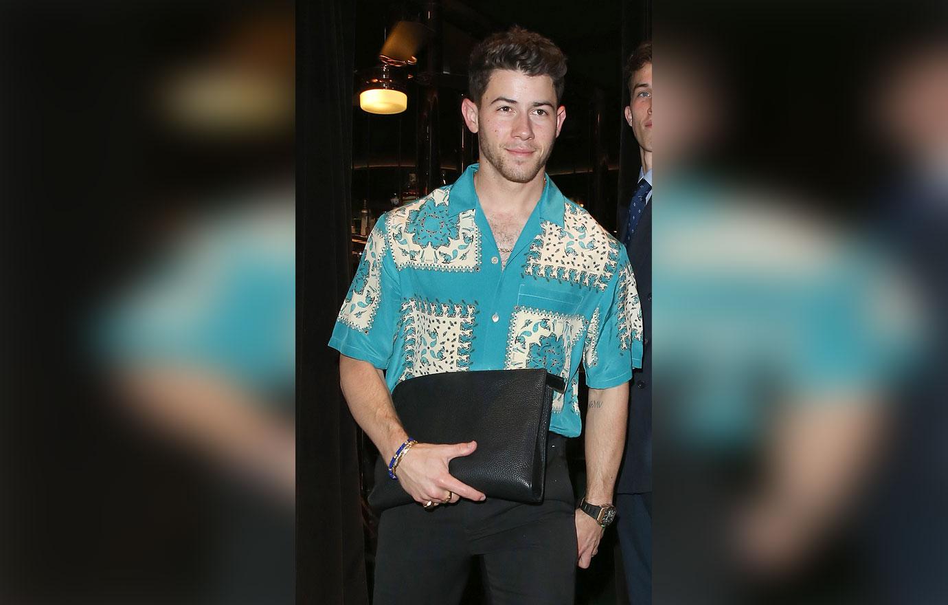 nick jonas leaving restaurant in london