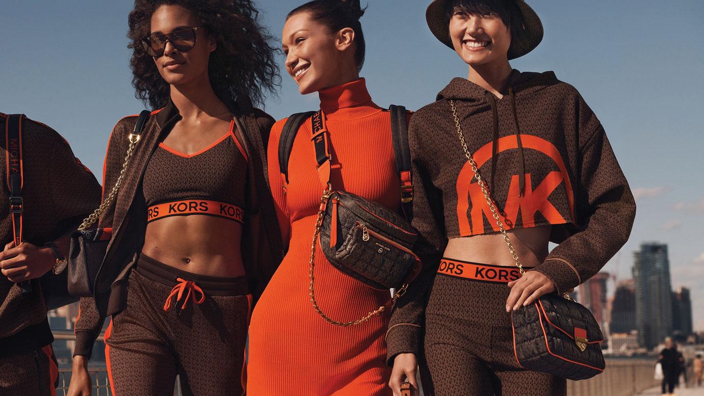 bella hadid takes a juice break on fashion shoot for michael kors