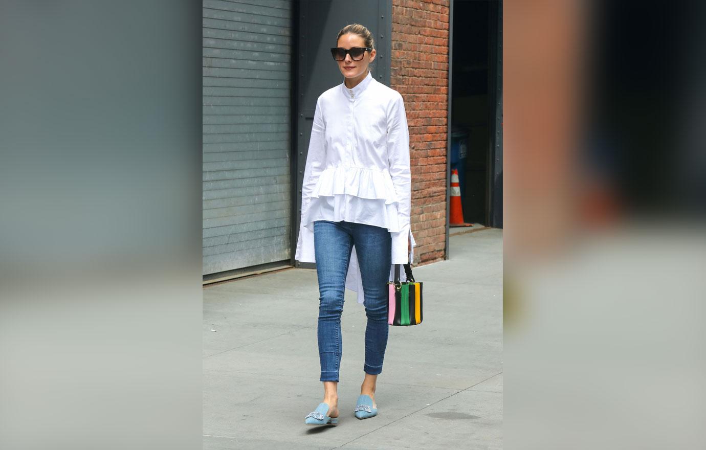 Olivia Palermo sashays around New York in torn jeans and black and white  striped top