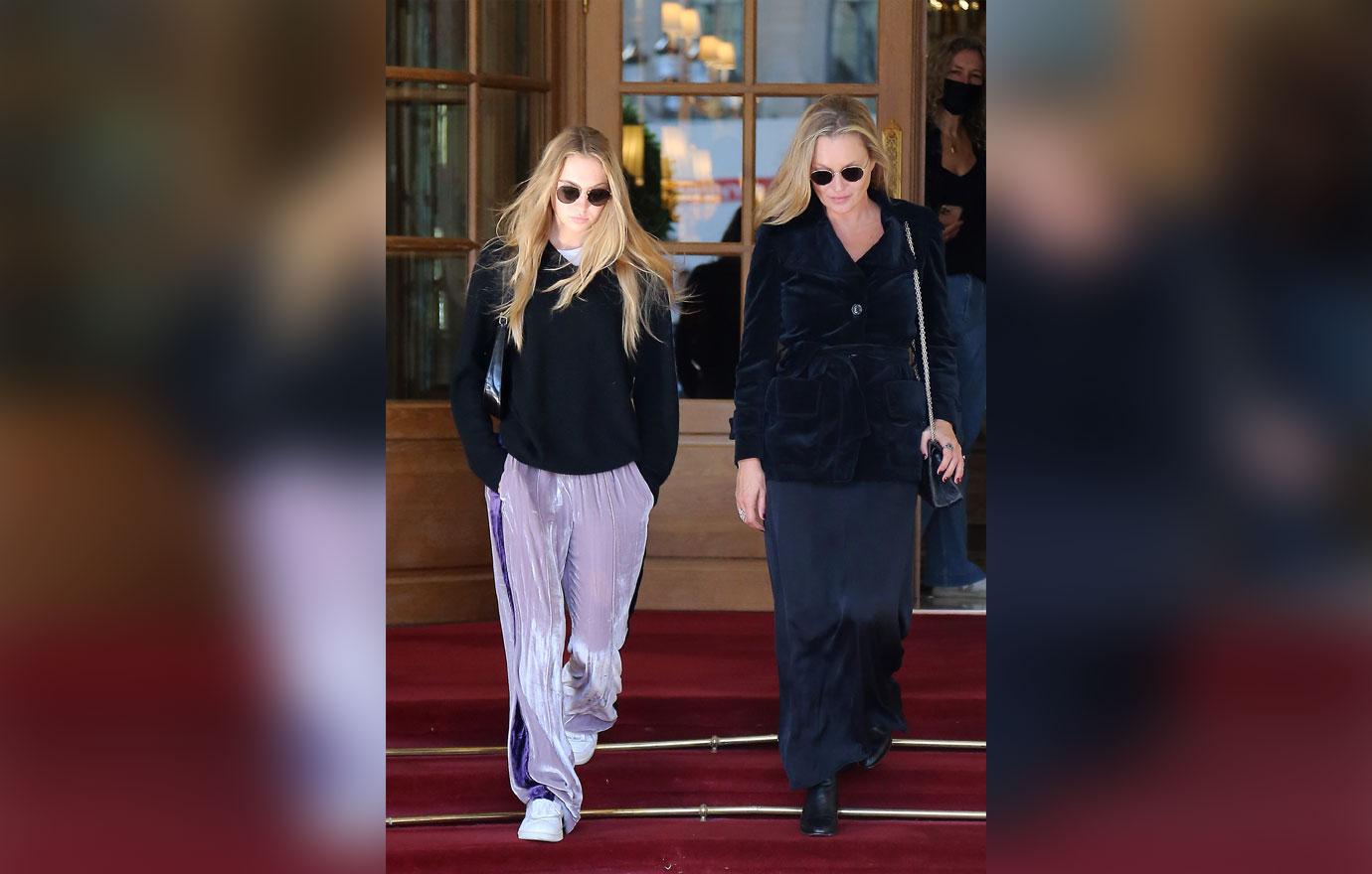 kate moss and lila grace seen leaving hotel in paris