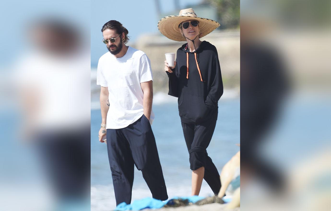 heidi klum and tom kaulitz enjoy a romantic walk on the beach