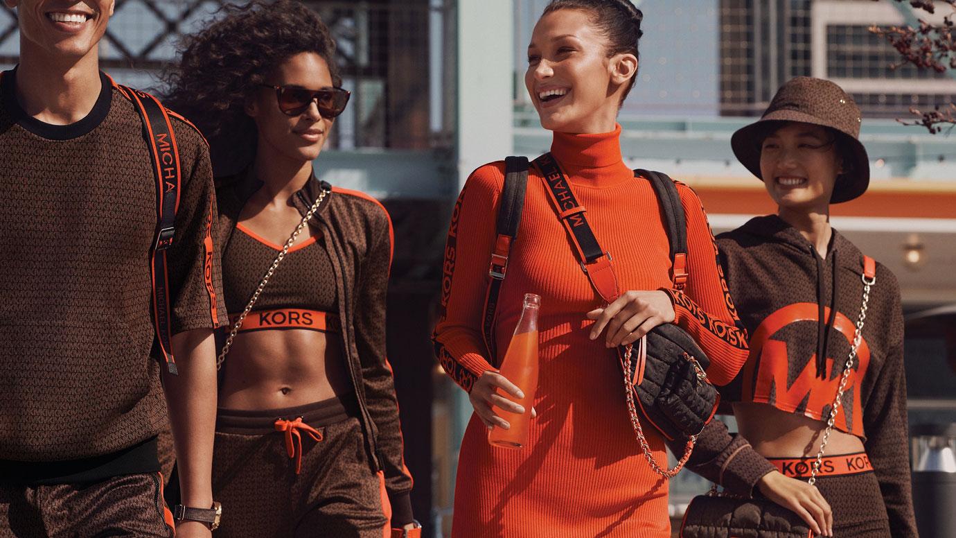 bella hadid takes a juice break on fashion shoot for michael kors