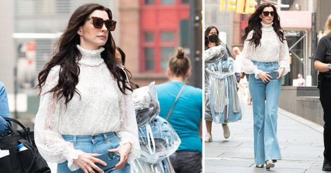 anne hathaway heads to the movie set of we crash in nyc