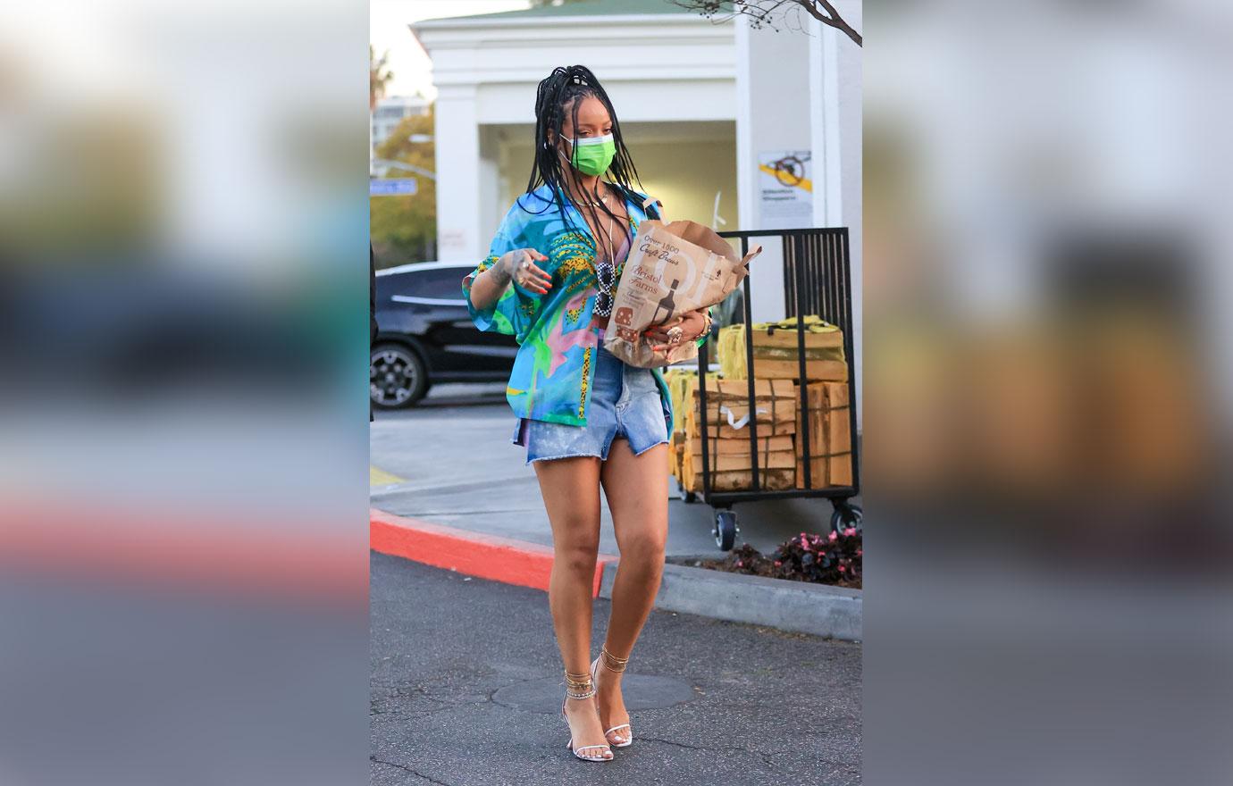 rihanna wears a bright outfit as she picks up groceries