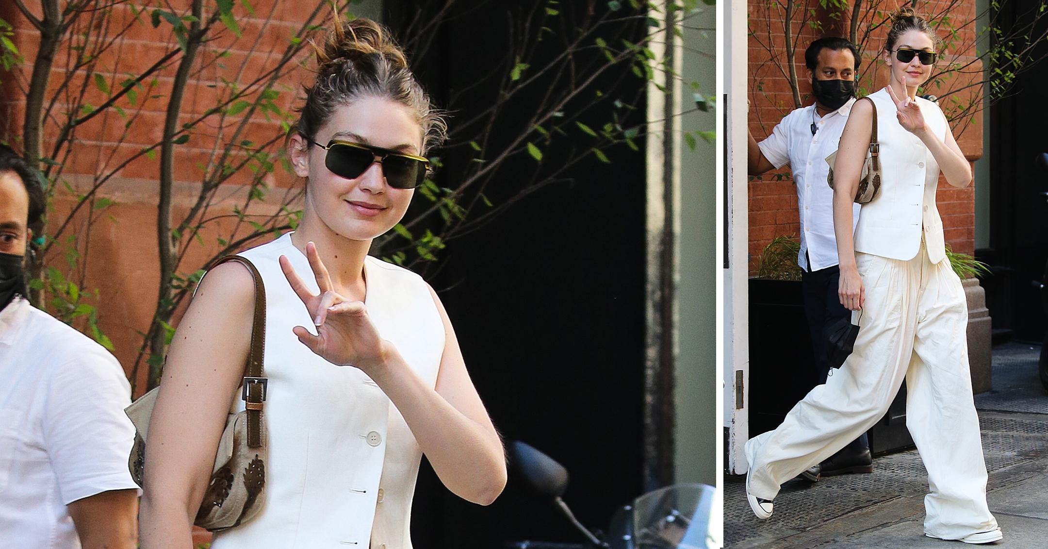 gigi hadid flashes a peace sign leaving mercer hotel