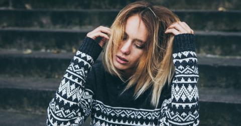 Photo of someone who appears to be exhausted.