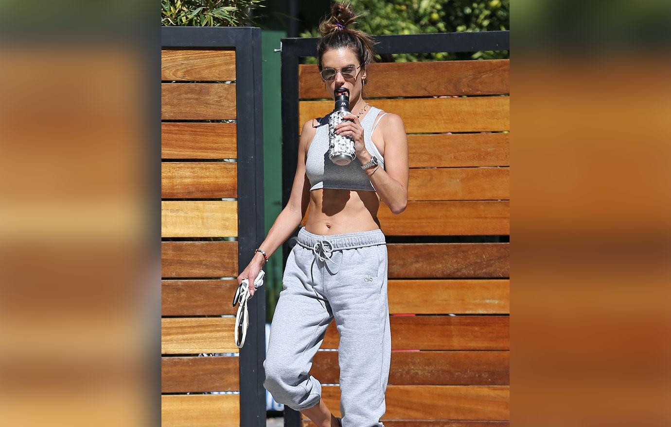 Alessandra Ambrosio keeps it sporty in beige workout top and leggings for  her daily Pilates class