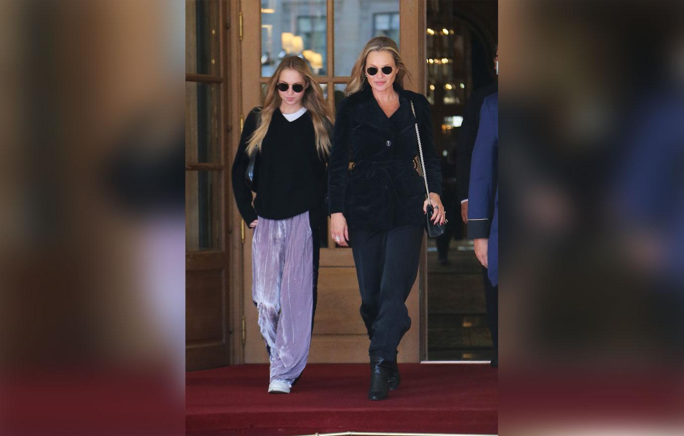 kate moss and lila grace seen leaving hotel in paris