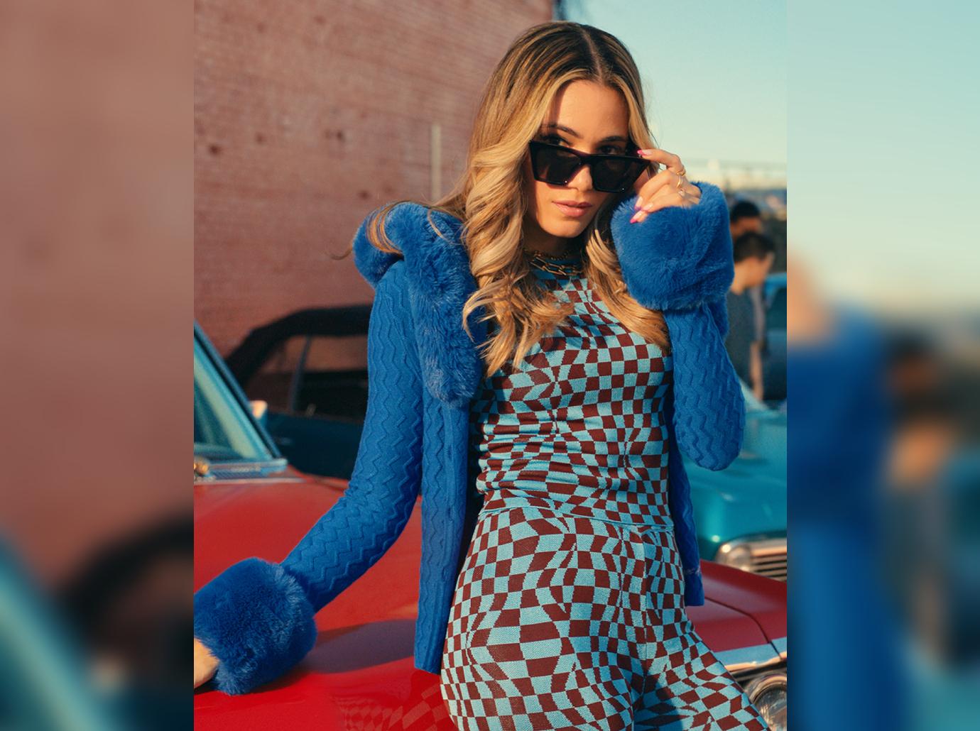 Singer CRYS Dishes On Her Career, Inspiring Others To Use Their Voice