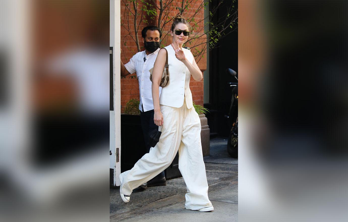 gigi hadid flashes a peace sign leaving mercer hotel