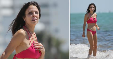 bethenny frankel wears a hot pink bikini and enormous engagement ring on the beach in miami