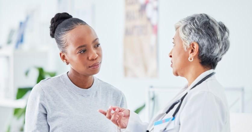 Photo of a doctor and patient. 