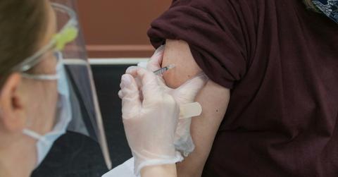 Photo of someone getting a shot.