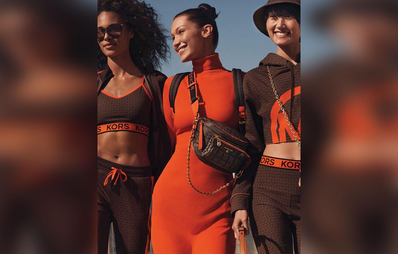 bella hadid takes a juice break on fashion shoot for michael kors