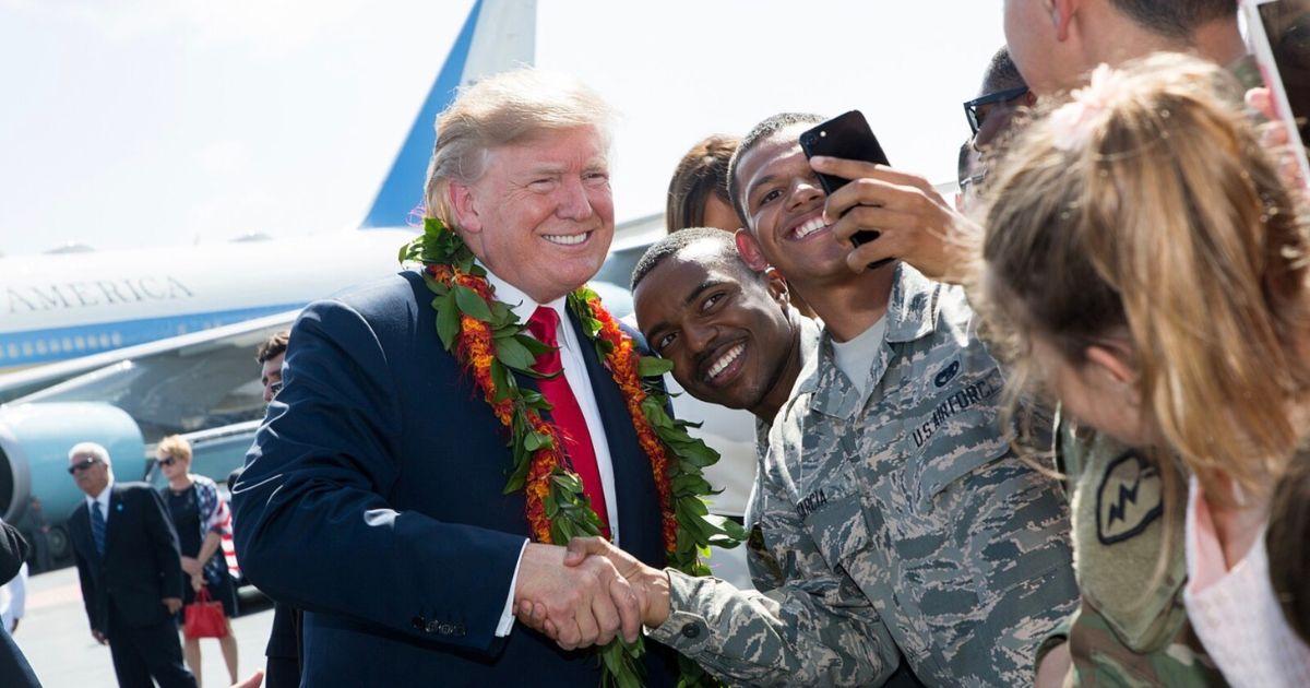 Donald Trump interacting with his supporters