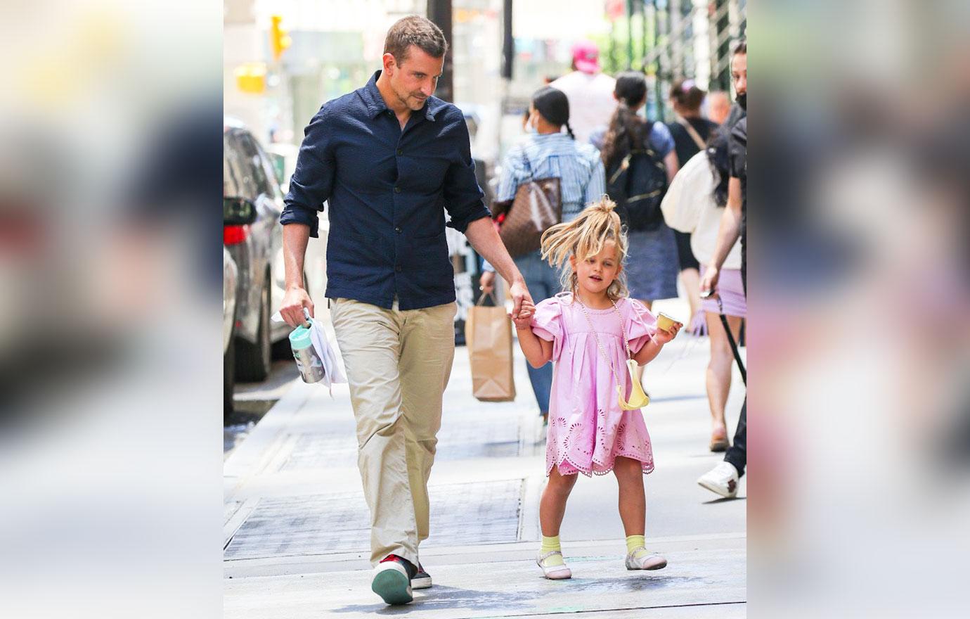 Bradley Cooper sweetly holds hands with daughter Lea, 6, as they enjoy an  after-school ice cream run in NYC