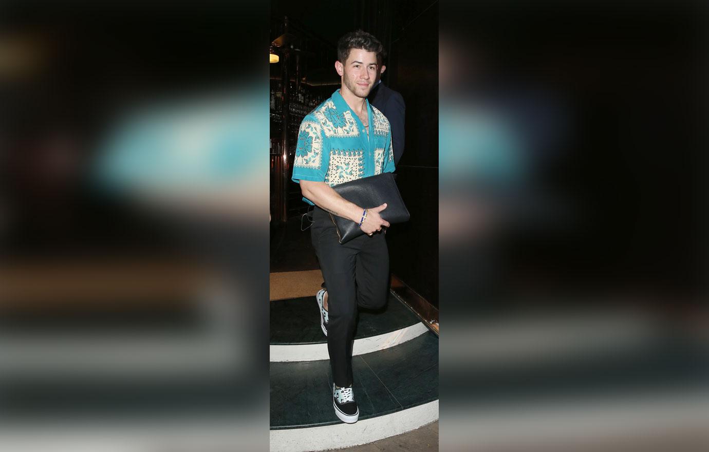 nick jonas leaving restaurant in london