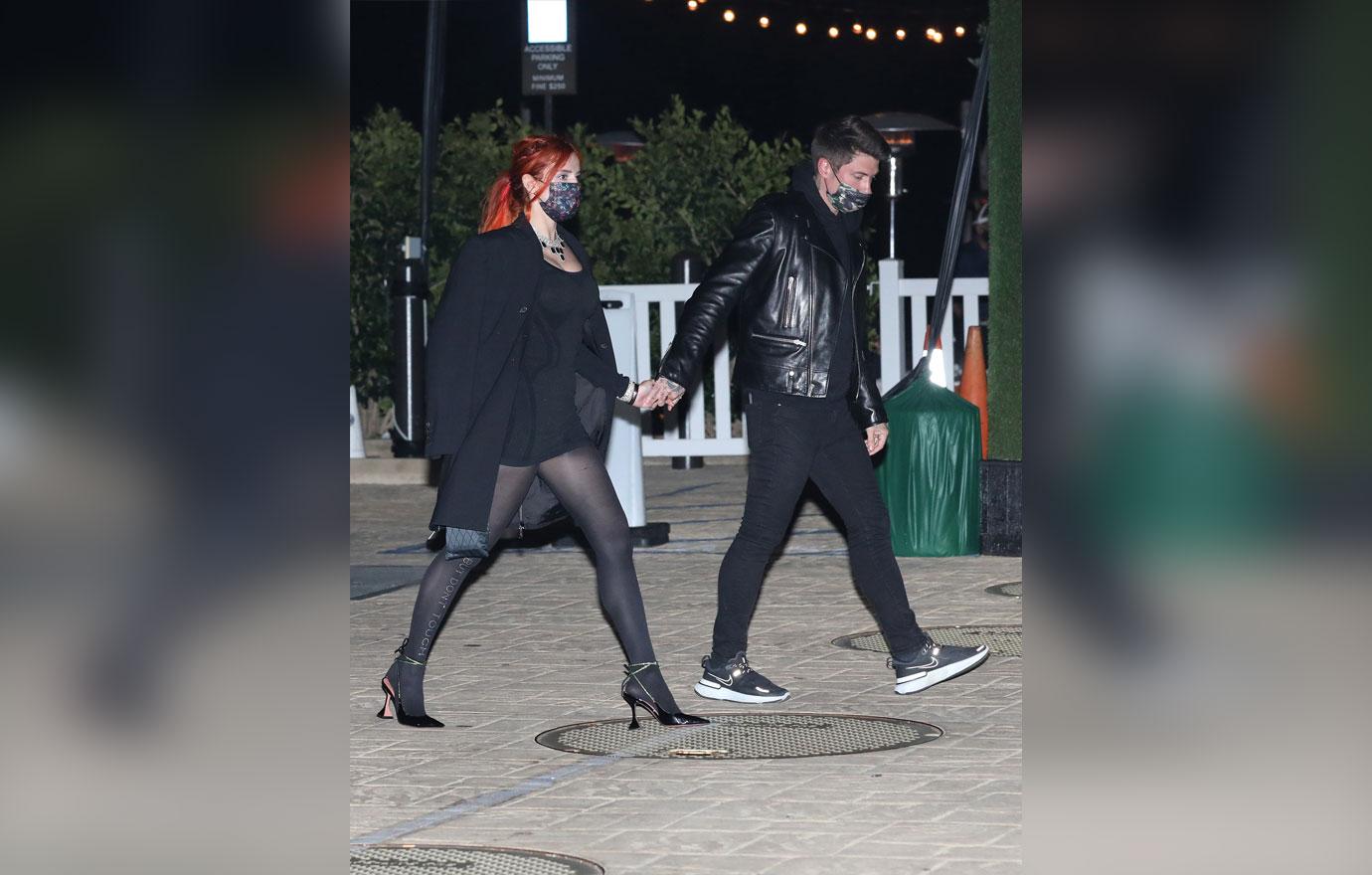 bella thorne and fiance benjamin mascolo walk hand in hand nobu malibu