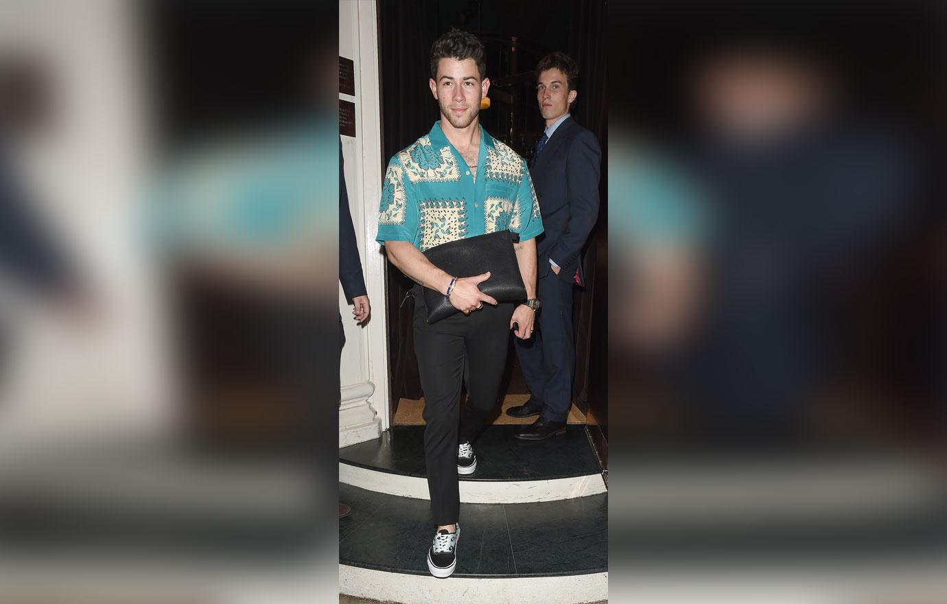 nick jonas leaving restaurant in london