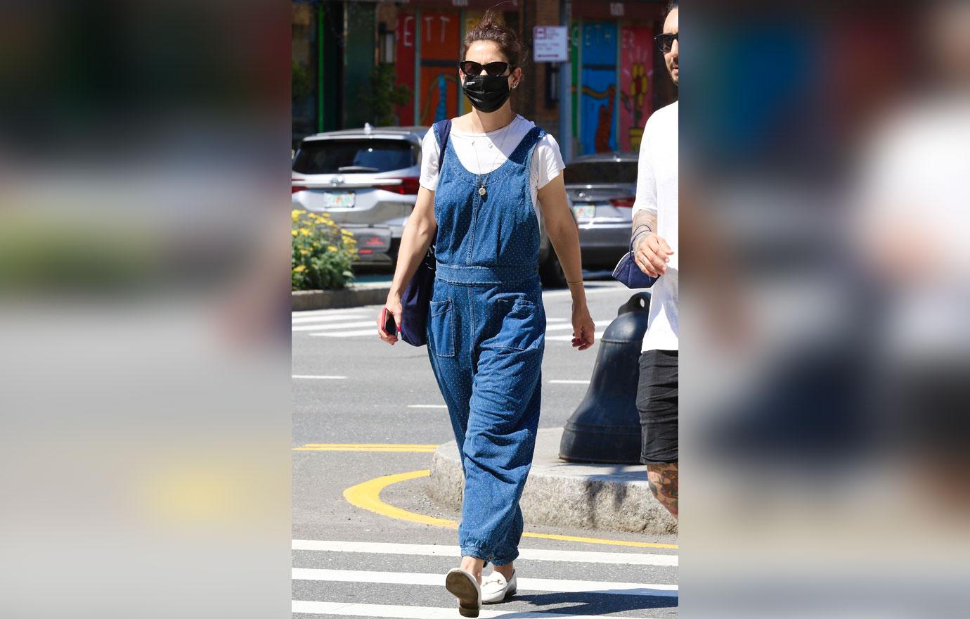 katie holmes steps out in blue overalls in  degree weather in nyc