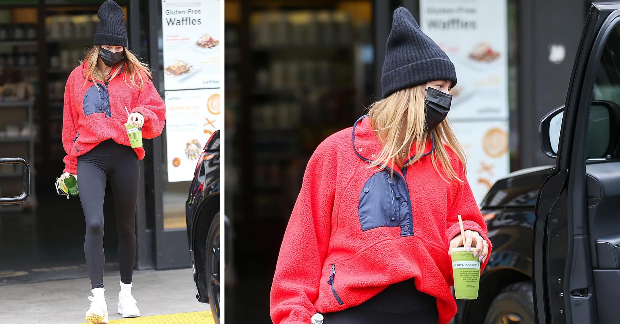 Hailey Baldwin Wears Red Sweatshirt And Black Leggings: Photos