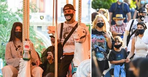 kourtney kardashian and travis barker take their modern family on a fun day out at disneyland mh